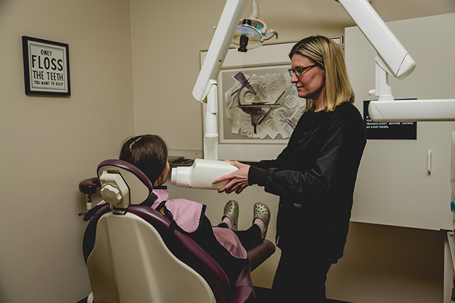 Patient getting an x-ray at Dental Smiles of Livonia